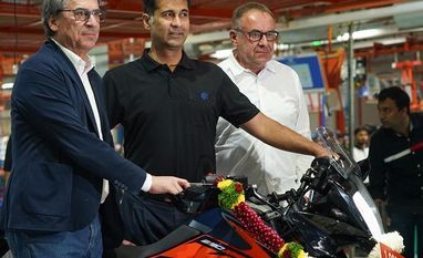 Bajaj Auto's electric Chetak to roll out in Europe by early 2024 Stefan Pierer, CEO, Pierer Mobility, Rajiv Bajaj, MD and CEO, Bajaj Auto, and Gerald Kiska, founder and chairman, Kiska GmbH at Chakan plant