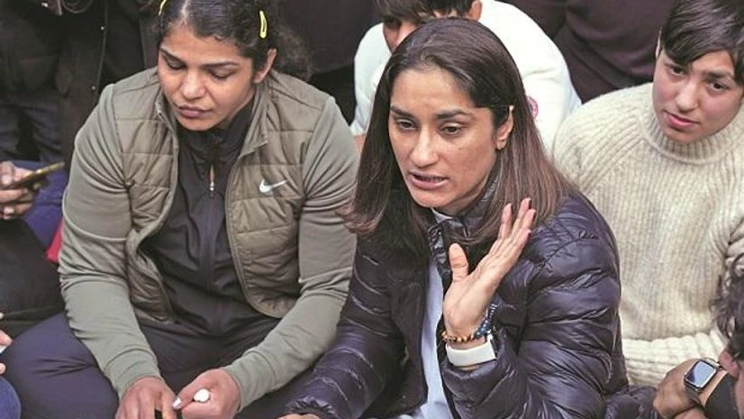 Vinesh Phogat Sakshi Malik Wrestlers Vinesh Phogat (right) and Sakshi Malik during a press conference regarding wrestlers’ protest against the Wrestling Federation of India. (Photo: PTI)