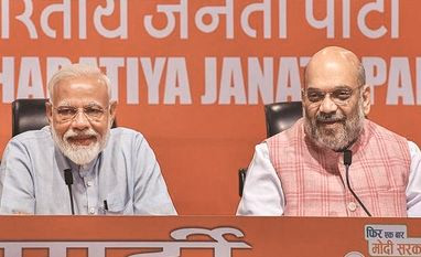 Narendra Modi Prime Minister Narendra Modi (left) with Union Home Minister Amit Shah (right).