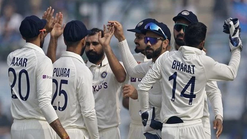 test cricket India's Mohammed Shami celebrates with teammates after taking the wicket of Australia's David Warner (REUTERS)