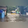 Mumbai braces for deluge as IMD issues alerts across Maharashtra. Details A+Bus+Moves+On+A+Flooded+Road+Following+Heavy+Rainfall%2C+Near+Andheri+Subway+In+Mumbai.+%28Photo%3A+PTI%29