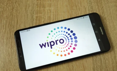 Wipro shares gain 5% as Q2 results beat expectations; brokerages divided Wipro