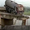Bridge collapsed while under construction. Motorway bridge collapse during construction.